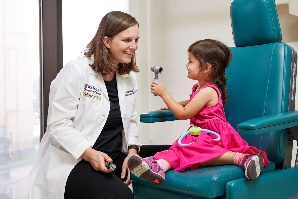 WashU Medicine pediatrician and patient